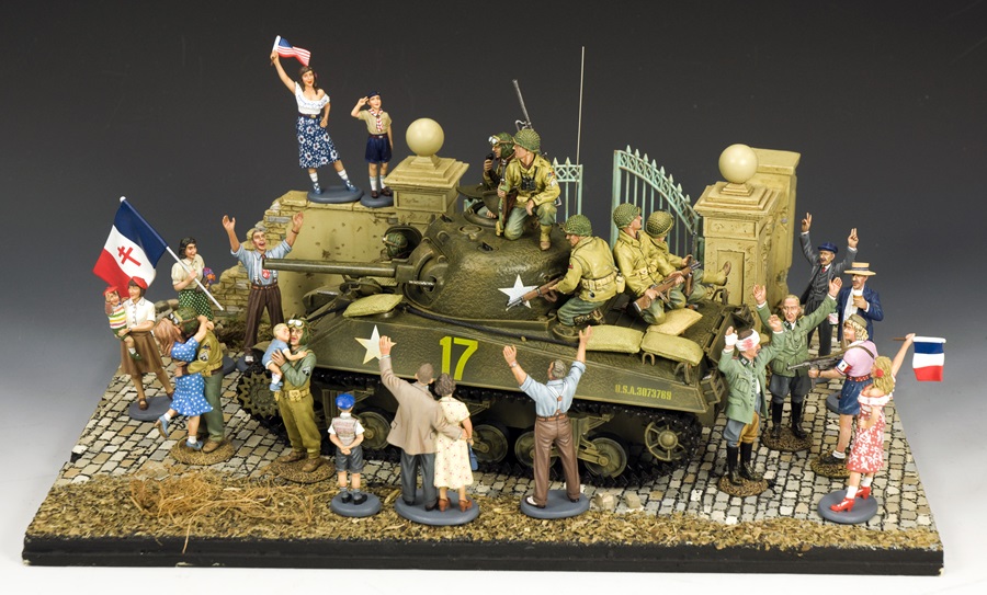 King & Country Normandy liberation diorama with Sherman tank, American soldiers, and French civilians